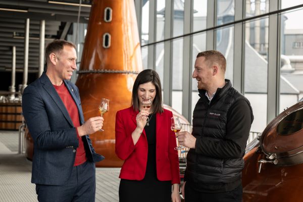 Ewan Andrew tasting whisky in distillery